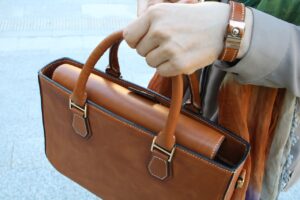 Lady holding handbag for business